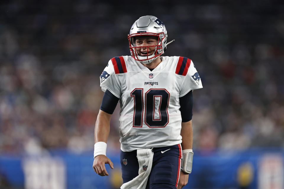 Mac Jones will start from Day 1 for Bill Belichick and the New England Patriots, who cut Cam Newton on Tuesday. (AP Photo/Adam Hunger)