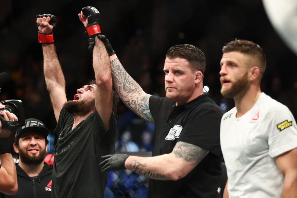 MOSCOW, RUSSIA  NOVEMBER 10, 2019: UFC featherweight fighter Zabit Magomedsharipov (L) of Russia after winning a bout against Calvin Kattar (R) of the United States as part of the UFC Fight Night 163 mixed martial arts event, at CSKA Arena. Valery Sharifulin/TASS (Photo by Valery Sharifulin\TASS via Getty Images)