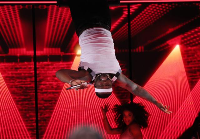 50 Cent says hanging upside down during the Super Bowl halftime show ...