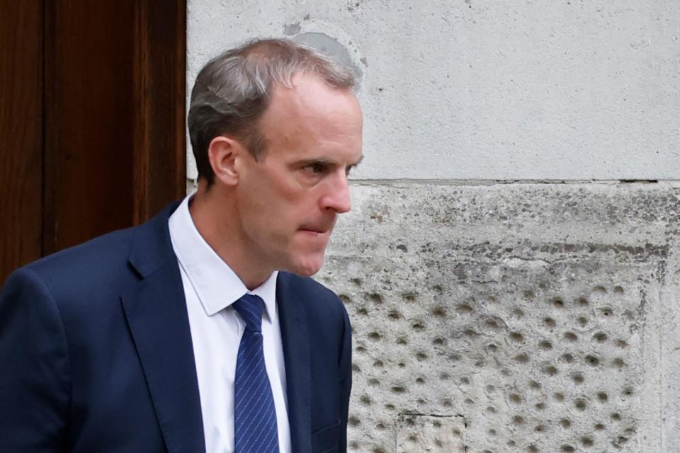 Britain's Foreign Secretary Dominic Raab leaves the Foreign, Commonwealth and Development Office headed for Downing Street in central London on August 20, 2021. - Britain's Foreign Secretary Dominic Raab on August 20 defied demands to quit after failing to make a telephone call to help translators fleeing Afghanistan, saying the Taliban's rapid advance made contact impossible. (Photo by Tolga Akmen / AFP) (Photo by TOLGA AKMEN/AFP via Getty Images)