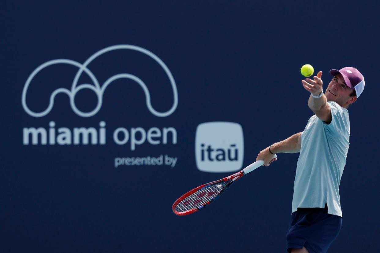 Mar 23, 2024; Miami Gardens, FL, USA; Tommy Paul (USA) serves against Martin Damm Jr. (USA) (not pictured) on day six of the Miami Open at Hard Rock Stadium. Mandatory Credit: Geoff Burke-USA TODAY Sports