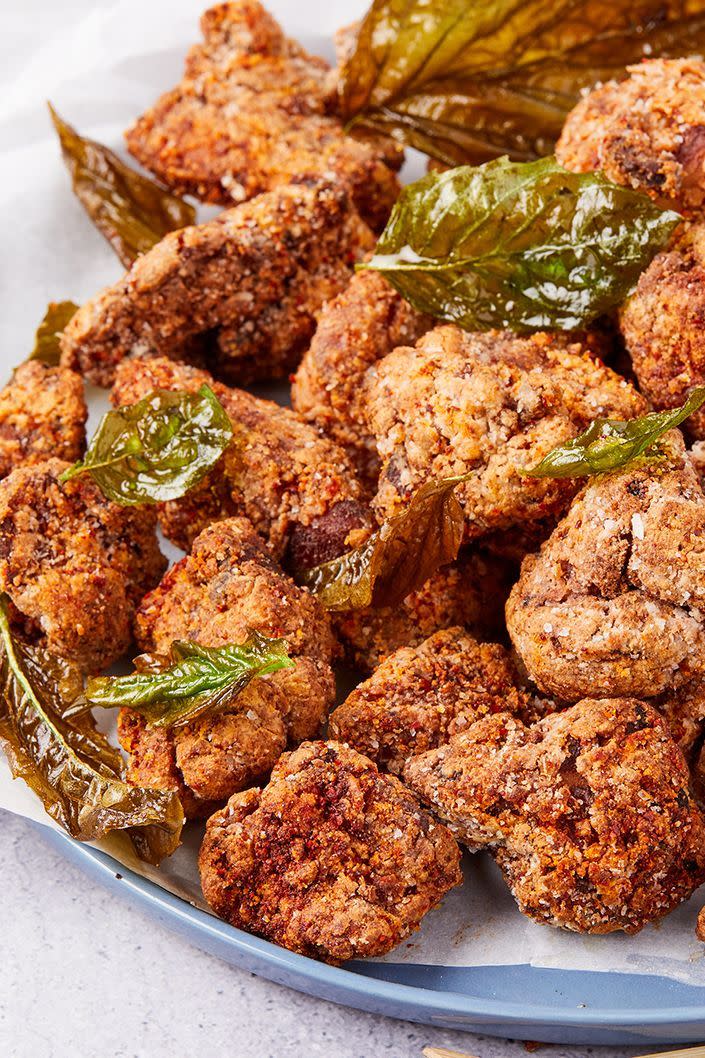 <p>This <a href="https://www.delish.com/cooking/recipe-ideas/recipes/a50923/baked-popcorn-chicken-recipe/" rel="nofollow noopener" target="_blank" data-ylk="slk:popcorn chicken;elm:context_link;itc:0;sec:content-canvas" class="link ">popcorn chicken</a> stands above the rest, thanks to five-spice heightened with some white pepper, Sichuan peppercorns, onion powder, and mildly spicy gochugaru. A touch of brown sugar rounds out the harshness of the vinegar and merges both flavors into tenderizing greatness. </p><p>Get the <strong><a href="https://www.delish.com/cooking/recipe-ideas/a36008356/taiwanese-popcorn-chicken-recipe/" rel="nofollow noopener" target="_blank" data-ylk="slk:Taiwanese Popcorn Chicken recipe;elm:context_link;itc:0;sec:content-canvas" class="link ">Taiwanese Popcorn Chicken recipe</a></strong>.</p>