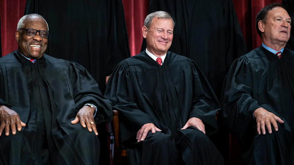 Justice Clarence Thomas, left, wrote the 7-2 majority opinion in favor of the CFPB, with Justices Samuel Alito, right, and Neil Gorsuch dissenting.