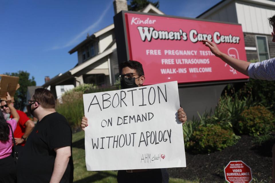 Members of the Communist Party organization “Anna Hass Morgan Club” gather outside of the Women’s Care Center located across from the Planned Parenthood on E Main Street to form an “Emergency Roe Decision Picket” to protest the SCOTUS decision to overturn Roe v Wade.
