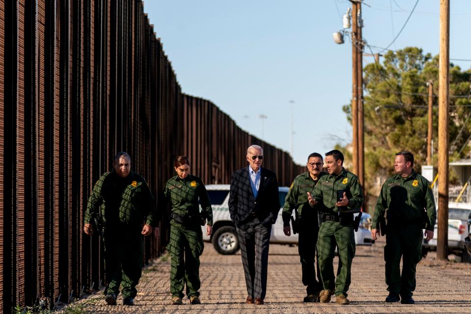 President Joe Biden talks with U.S. Border Patrol agents as they walk along the U.S.-Mexico border in El Paso, Texas, on Jan. 8, 2023. A year later, asked whether he believed the border is secure, he answers: "I haven't believed that for the last 10 years, and I've said it for the last 10 years. Give me the money."