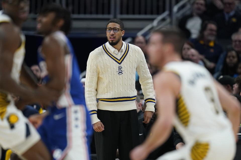 Indiana Pacers' Tyrese Haliburton watches during the first half of the team's NBA basketball game against the Philadelphia 76ers, Thursday, Jan. 25, 2024, in Indianapolis. (AP Photo/Darron Cummings)