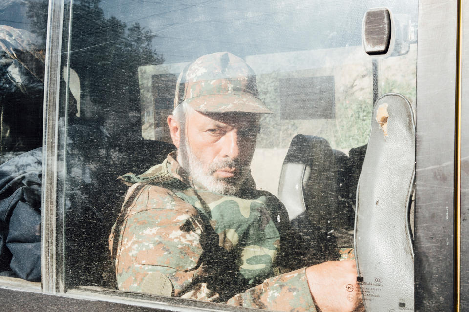 An Armenian soldier sits inside a vehicle near the town of Karmir Shuka.<span class="copyright">Emanuele Satolli</span>