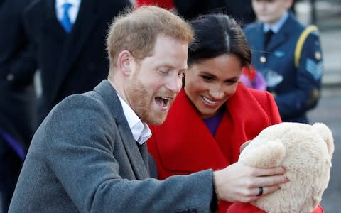 The Duke and Duchess of Sussex during a walkabout in Birkenhead - Credit: Reuters
