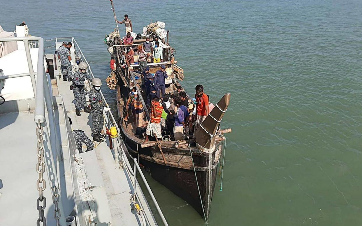 Dozens of Rohingya have been stranded at sea for weeks as they desperately tried to reach Malaysia - STR/AFP