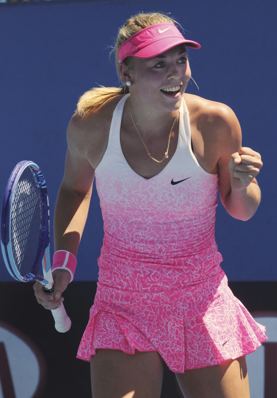 Carina Witthoeft of Germany celebrates defeating Christina McHale of the U.S. to win their women's singles second round match at the Australian Open 2015 tennis tournament in Melbourne January 21, 2015. REUTERS/John French (AUSTRALIA - Tags: SPORT TENNIS)