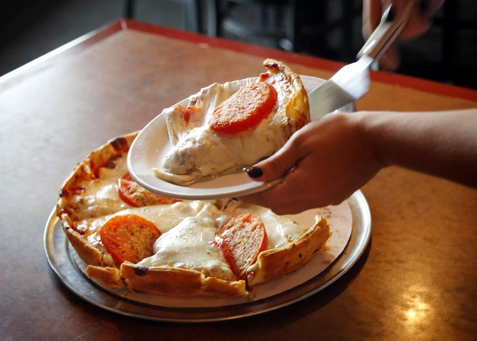 Wig & Pen in Ankeny serves a Union Jack on the Flying Tomato crust, a deep-dish pizza.