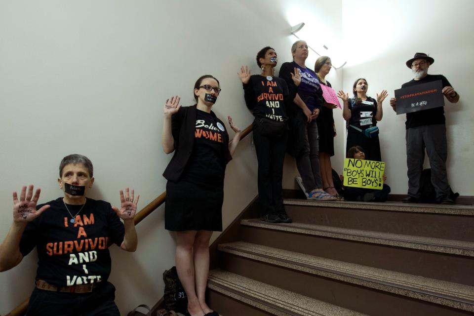 Protesters speak out as Kavanaugh hearing begins