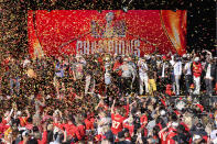 FILE - The Kansas City Chiefs celebrate during their victory rally in Kansas City, Mo., Wednesday, Feb. 14, 2024. The Chiefs defeated the San Francisco 49ers Sunday in the NFL Super Bowl 58 football game. (AP Photo/Reed Hoffmann, File)