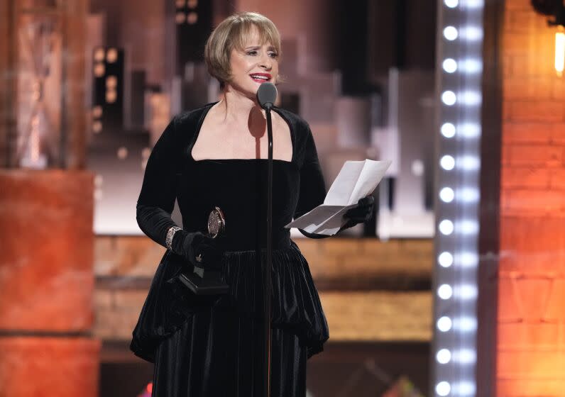 Patti LuPone accepts the award for best featured actress in a musical for "Company" at the 75th annual Tony Awards on Sunday, June 12, 2022, at Radio City Music Hall in New York. (Photo by Charles Sykes/Invision/AP)