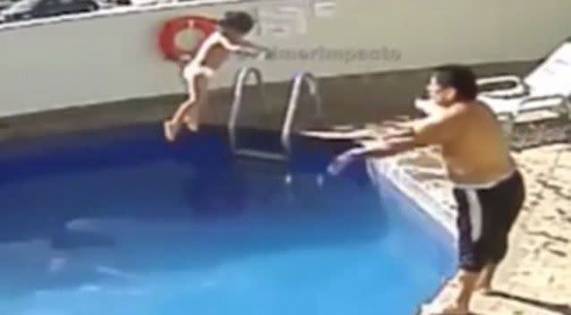 On the footage he can be seen throwing the toddler into the pool then walking away while the child struggles to float and swim. Source: Supplied.