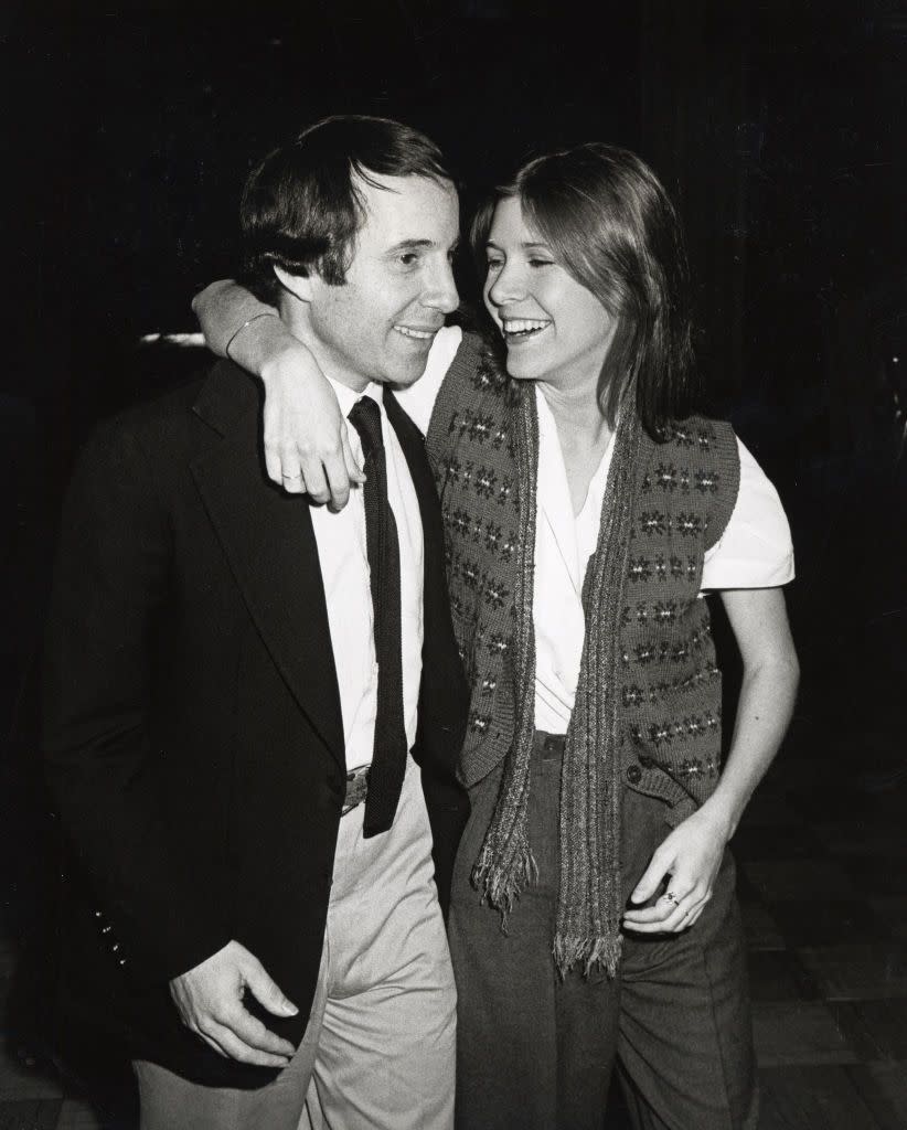 1980: Carrie Fisher and Paul Simon