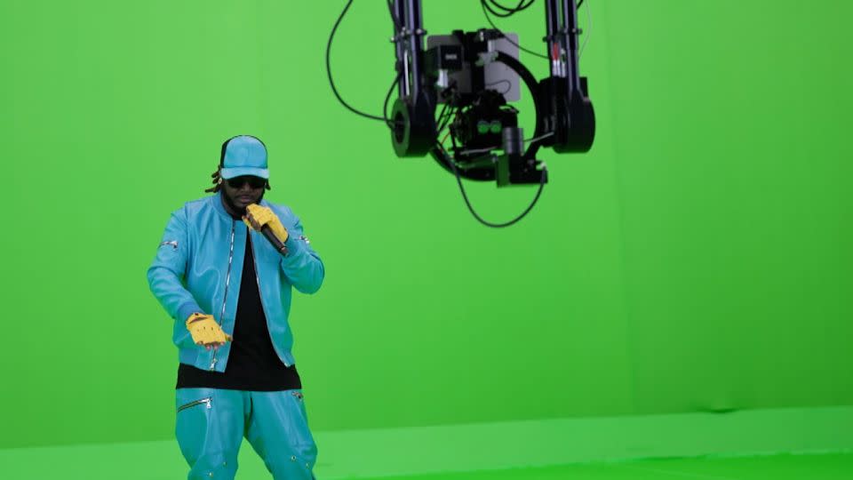 T-Pain performs to the camera during the filming of his upcoming VR concert. - CNN