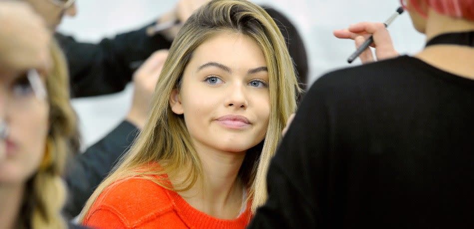 Thylane Blondeau smiles at an event