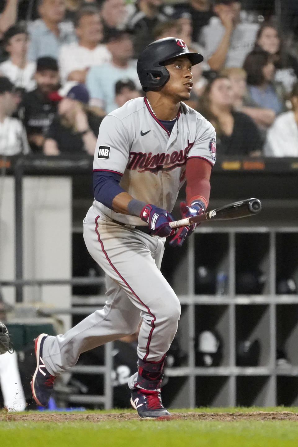 Minnesota Twins' Jorge Polanco watches his three-run home run off Chicago White Sox relief pitcher Codi Heuer during the sixth inning of a baseball game Wednesday, July 21, 2021, in Chicago. (AP Photo/Charles Rex Arbogast)