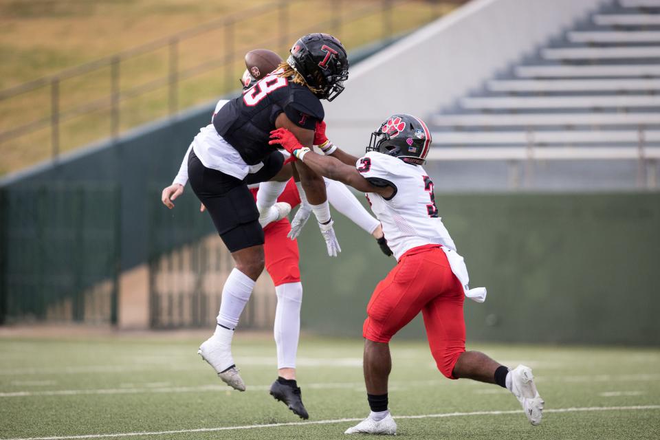 Amarillo Tascosa Rebel’s Keevin Ledoux (39)  blocks a punt during a Region I-5A Division I semifinal game against the Colleyville Heritage Panthers at Memorial Stadium in Wichita Falls, TX.