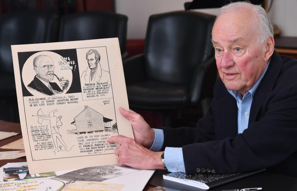For years Lawton Wood was a cartoonist for The Spartanburg Herald Journal. Here, his son, Paul Wood, talks about his father's work at the Spartanburg County Headquarters Library in downtown Spartanburg on Jan. 12, 2023. 