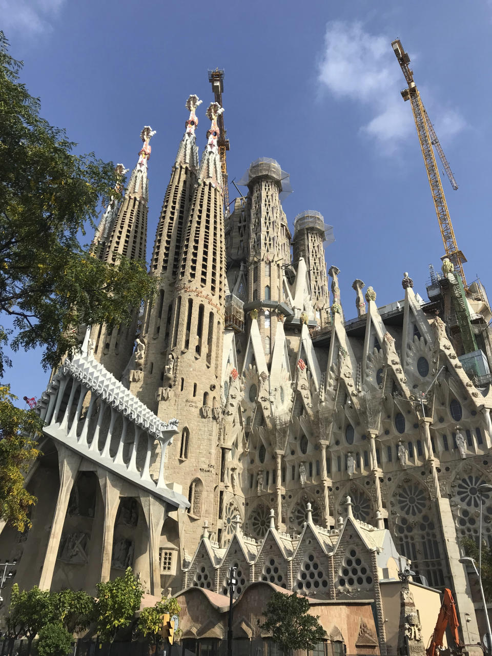 This Oct. 14, 2019 photo shows the Basílica de Sagrada Família, Anton Gaudí’s unfinished landmark, under construction in Barcelona, Spain. (Courtney Bonnell via AP)