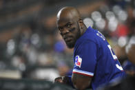 Texas Rangers' Adolis Garcia looks on from the dugout during the second inning of a baseball game against the Baltimore Orioles, Thursday, Sept. 23, 2021, in Baltimore. (AP Photo/Terrance Williams)