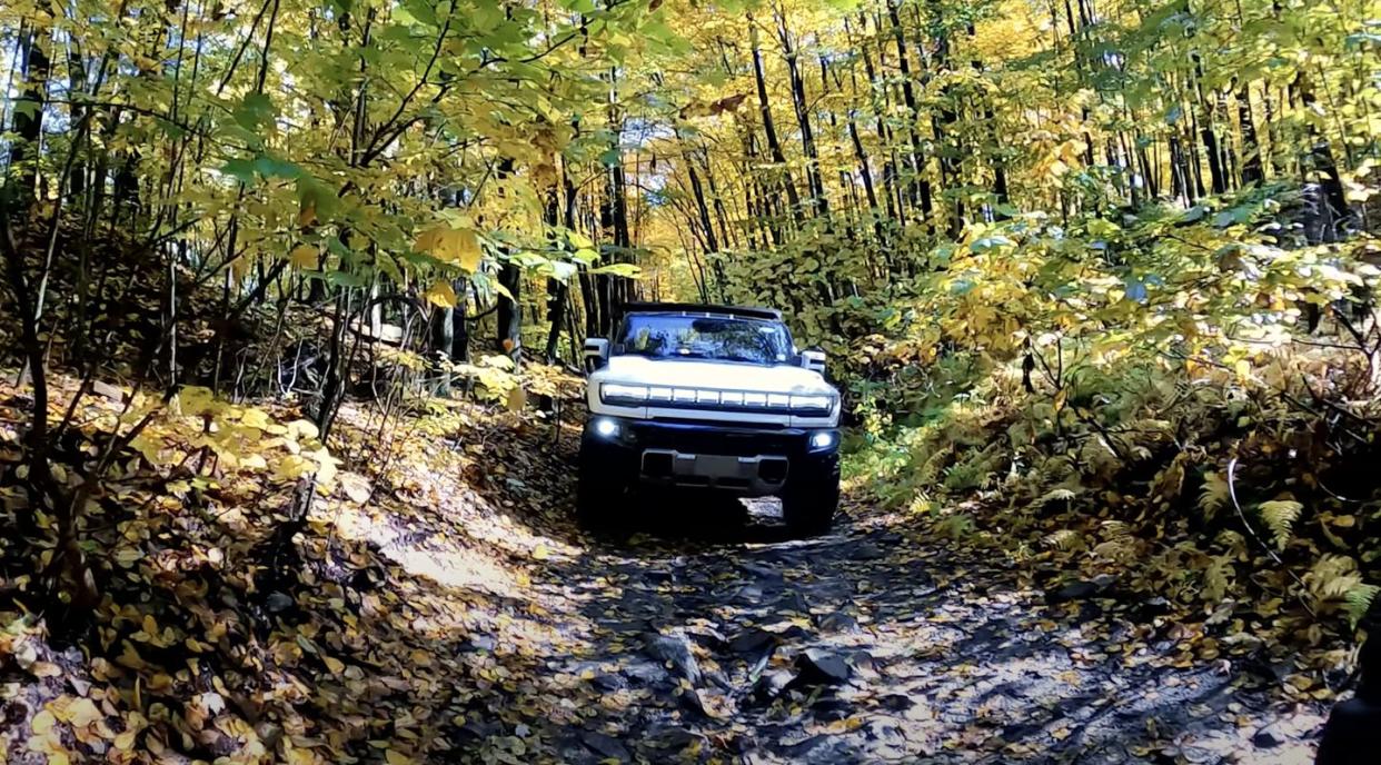 gmc hummer ev offroad on narrow trails