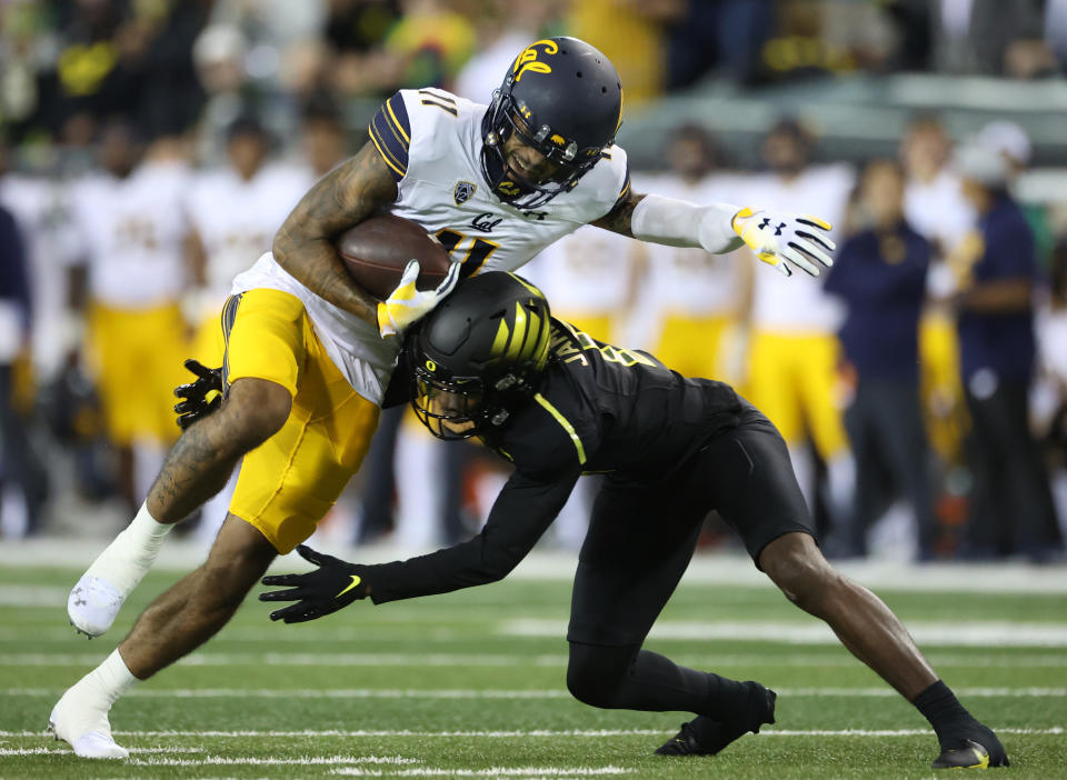 Oct 15, 2021; Eugene, Oregon, USA; Golden Bears wide receiver Kekoa Crawford (11) runs against the Oregon Ducks at Autzen Stadium. Mandatory Credit: Jaime Valdez-USA TODAY Sports