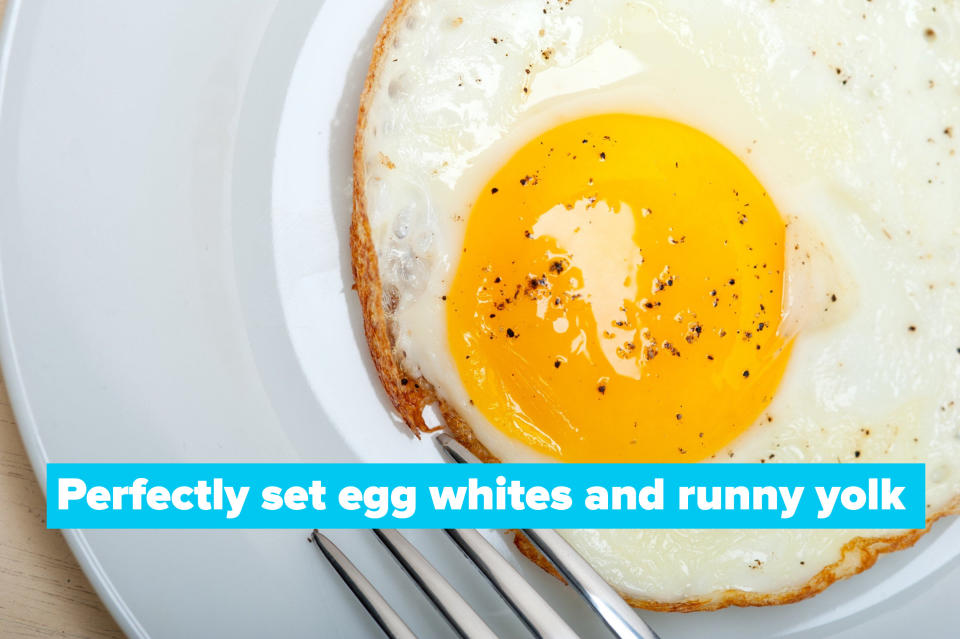 A fried egg on a plate.