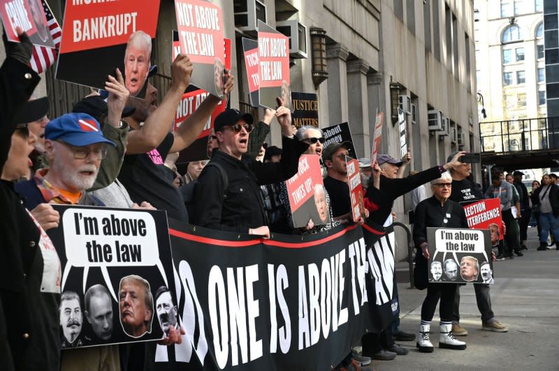 Anti-Trump supporters march outside Manhattan criminal court on Monday, April 15, 2024 in New York. Jury selection began today in the criminal hush money trial of former President Donald Trump who is accused of falsifying business records to hide his affair with adult film actress Stormy Daniels. Photo by Louis Lanzano/UPI