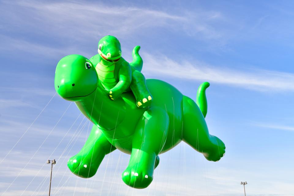 DINO and Baby DINO balloons by Sinclair Oil are taking a test flight during 96th Macy's Thanksgiving Day Parade - Balloonfest at MetLife Stadium on November 5, 2022 in East Rutherford, New Jersey.