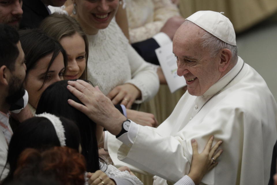 Pope Francis salutes the faithful at the end of his weekly general audience at the Vatican, Wednesday, Jan. 8, 2020. (AP Photo/Gregorio Borgia)