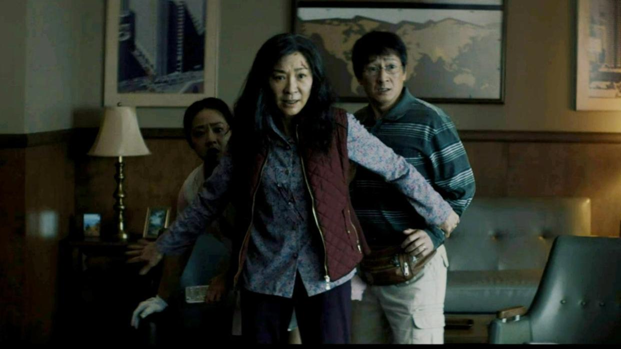  Michelle Yeoh, Stephanie Hsu, and Ke Huy Quan in Everything Everywhere All At Once. 