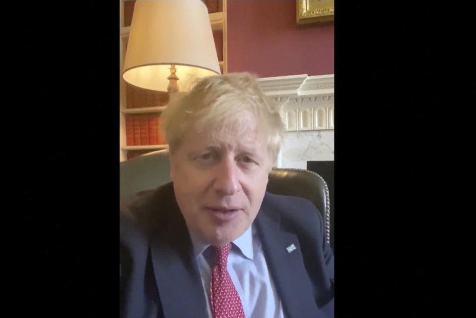 In this image taken from video of the TWITTER/@BorisJohnson, Britain's Prime Minister Boris Johnson announces he has tested positive for the new coronavirus, Friday March 27, 2020. Johnson's office said he was tested after showing mild symptoms and was now self-isolating, but would continue to lead the country's response to COVID-19. (TWITTER/@BorisJohnson via AP)