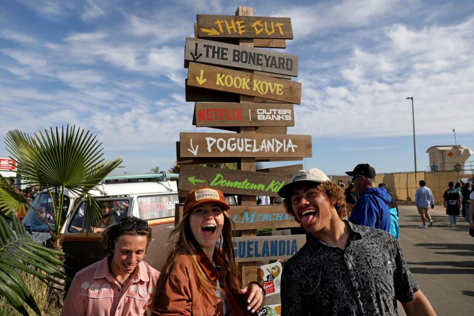 Attendees mug for a photo at Poguelandia