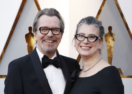 90th Academy Awards - Oscars Arrivals – Hollywood, California, U.S., 04/03/2018 – Gary Oldman and Gisele Schmidt. REUTERS/Mario Anzuoni
