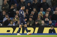 Manchester City's Phil Foden celebrates scoring their side's second goal of the game during the English Premier League soccer match between Brighton and Hove and Manchester City at the AMEX Stadium, Brighton, London, Saturday, Oct. 23, 2021. (Gareth Fuller/PA via AP)