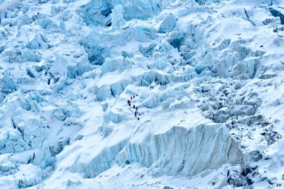 People hiking on Mount Everest