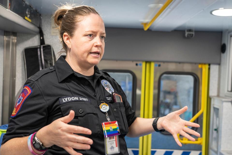 Austin-Travis County EMS medic Cassandra Lydon discusses how to treat patients with heat-related problems Thursday.