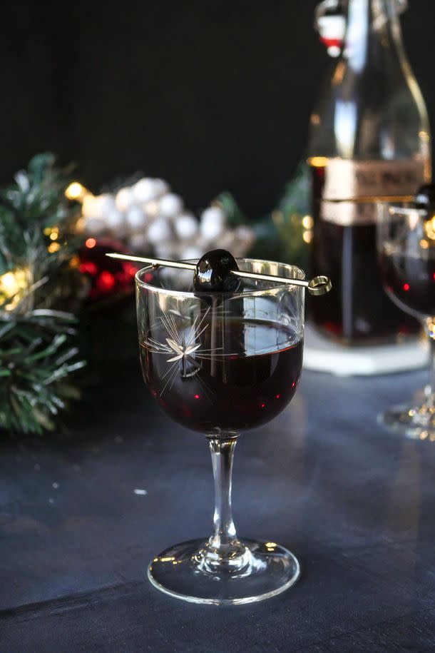 <p>You can mix up this classy-looking twist on a Manhattan ahead of time, so all you have to do on Christmas Day is serve it up!</p><p><strong>Get the recipe at <a href="http://stirandstrain.com/2019/11/29/black-christmas-bottled-cocktails/" rel="nofollow noopener" target="_blank" data-ylk="slk:Stir and Strain;elm:context_link;itc:0;sec:content-canvas" class="link ">Stir and Strain</a>.</strong> </p>