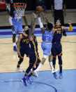 Houston Rockets' Kenyon Martin Jr. (6) has his shot attempt blocked by Golden State Warriors' Juan Toscano-Anderson (95) during the third quarter of an NBA basketball game Saturday, May 1, 2021, in Houston. (Bob Levey/Pool Photo via AP)