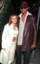 <b>Carmen Electra, Dennis Rodman</b><br> Model Carmen Electra and NBA star Dennis Rodman decided to tie the knot somewhere where their eccentric styles would blend in with the scenery ... so they chose Vegas, naturally. The couple tied the knot in November 1998 at the Little Chapel of the Flowers, but soon learned marriage wasn't as rosy as they thought. Electra filed for an annulment nine days later. "It's easy to get caught up in a moment," Electra told <a href=" http://www.people.com/people/carmen_electra/biography/0,,,00.html" rel="nofollow noopener" target="_blank" data-ylk="slk:People;elm:context_link;itc:0;sec:content-canvas" class="link ">People</a> afterwards. "You think it's romantic, but then you realize, 'God, we did it in Vegas?' It's like getting a cheeseburger at a fast-food restaurant."