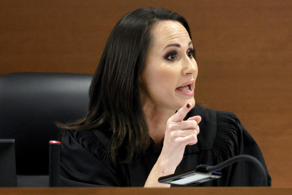 Judge Elizabeth Scherer orders Chief Assistant Public Defender David Wheeler to sit in the back of the courtroom during the sentencing hearing for Marjory Stoneman Douglas High School shooter Nikolas Cruz at the Broward County Courthouse in Fort Lauderdale, Fla. on Tuesday, Nov. 1, 2022. Cruz was sentenced to life in prison for murdering 17 people at Parkland's Marjory Stoneman Douglas High School more than four years ago. (Amy Beth Bennett/South Florida Sun Sentinel via AP, Pool)