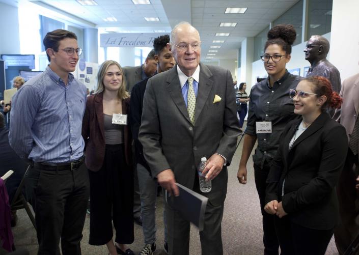 Former U.S. Supreme Court Justice Anthony Kennedy, center, visits with students from C.K. McClatchy High School, his former high school, during a luncheon held for high school civics students in Sacramento, Calif., on Friday, Sept. 28, 2018. Kennedy was in his home city speaking to high schoolers about civil discourse and the Constitution. Kennedy declined to comment on the confirmation process of Judge Brett Kavanaugh. (AP Photo/Steve Yeater)