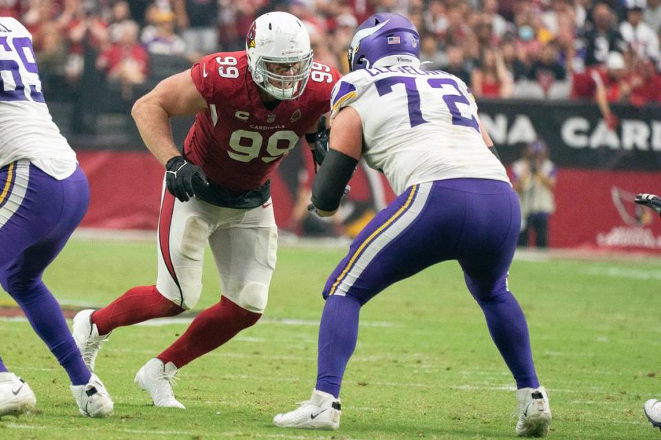 The Arizona Cardinals’ J.J. Watt, left, goes against the Minnesota Vikings’ Ezra Cleveland during their game Sept 19 in Glendale, Arizona.