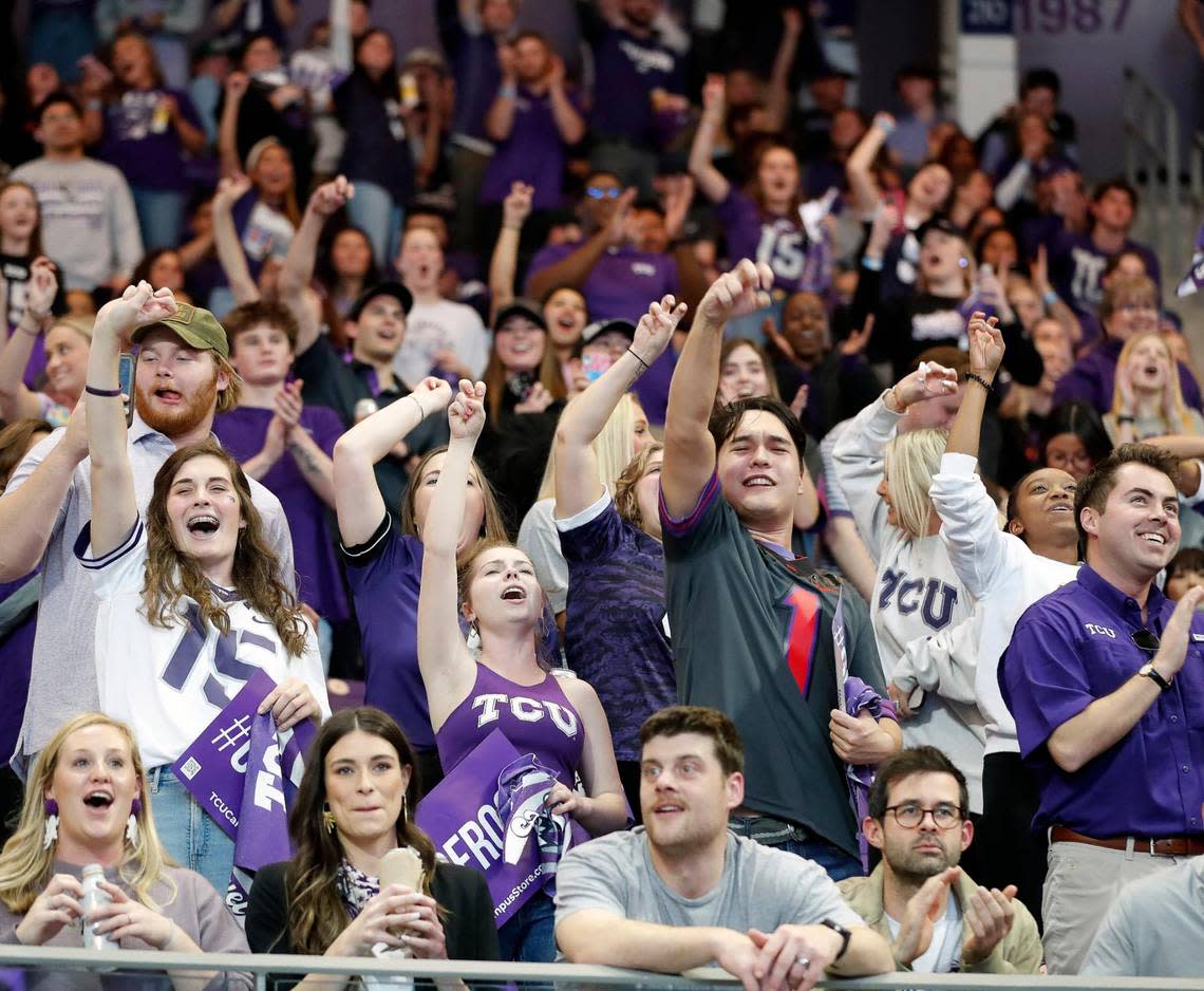 Frog fans celebrate TCU’s first touchdown during the CFP national championship football game watch party at Schollmeier Arena, in Fort Worth, Texas, Monday, Jan 9, 2023.