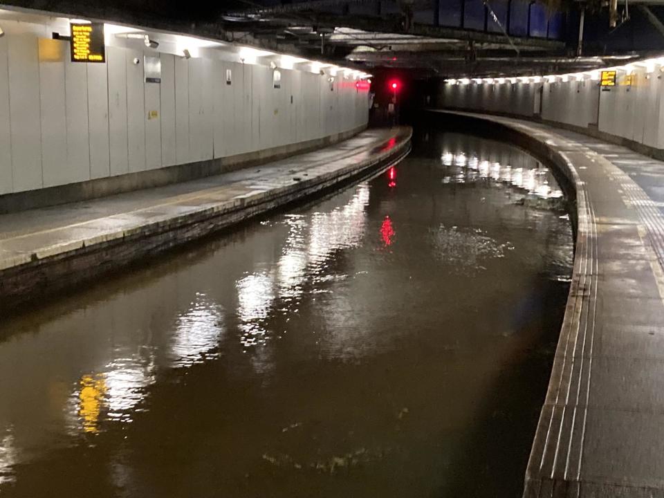 Flooding at Dalmarnock - one of a number of problems facing the rail network as it bids to get back to normal operations for the start of the week (Pic: Network Rail)