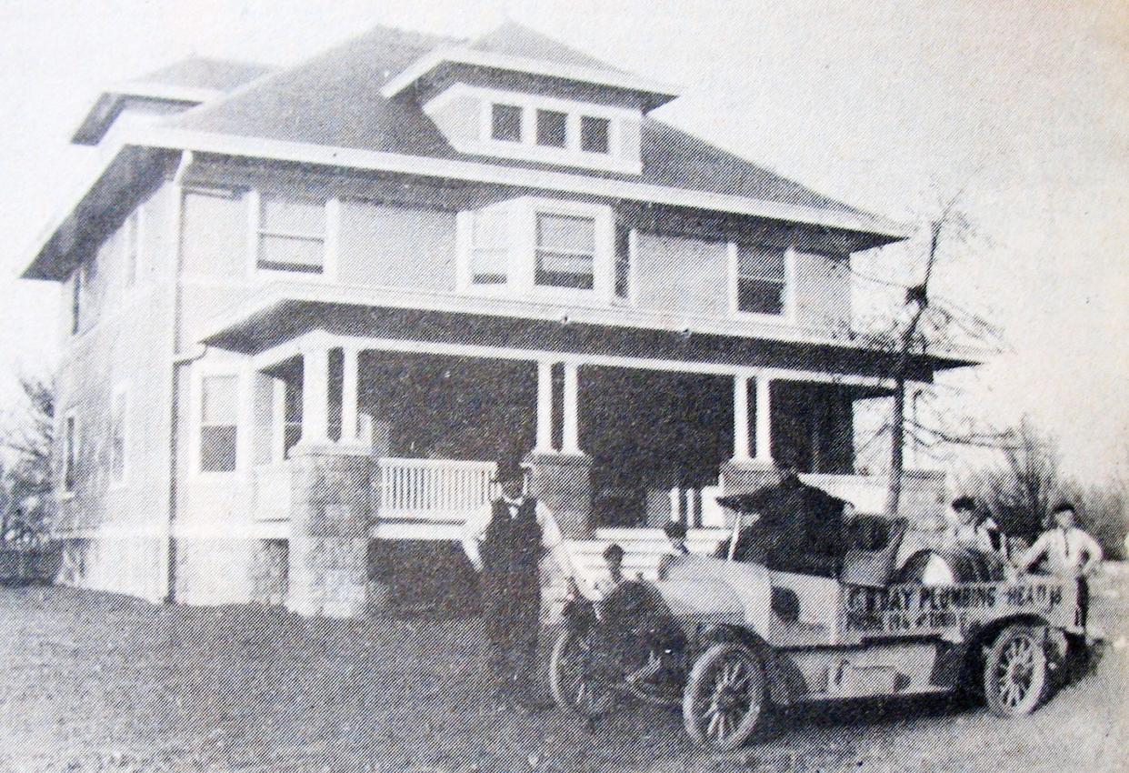 The C.B. Day Plumbing and Heating crew used this vehicle to make house calls in 1913.