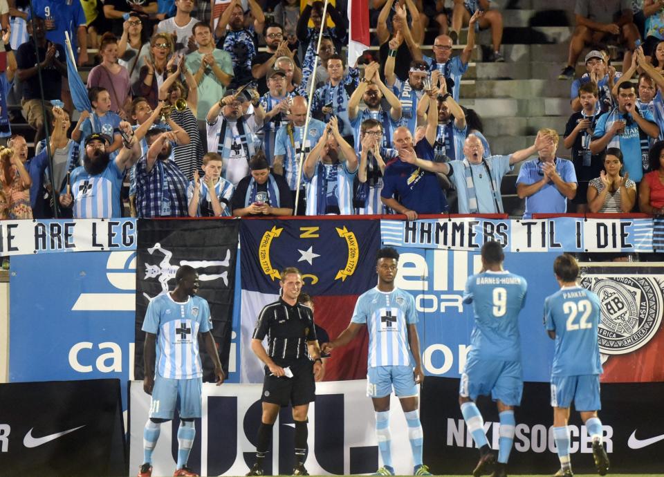 Wilmington Hammerheads fans cheer in the final minute of the win against Richmond at Legion Stadium in Wilmington N.C., Saturday, September 24, 2016.  MATT BORN/STARNEWS